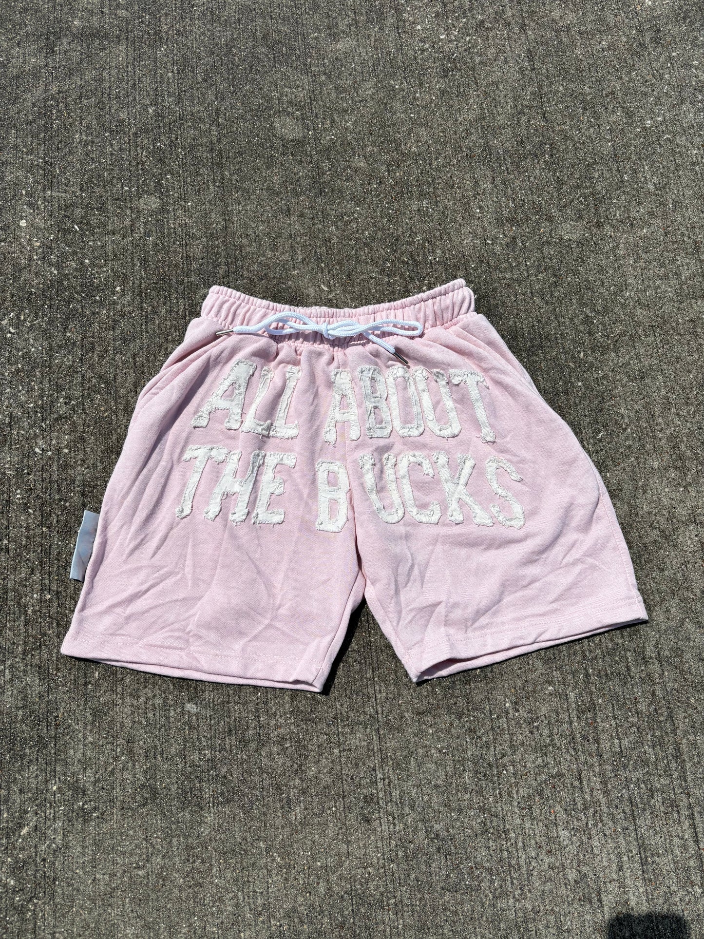 Pink AllAboutTheBuck$ Distressed Shorts
