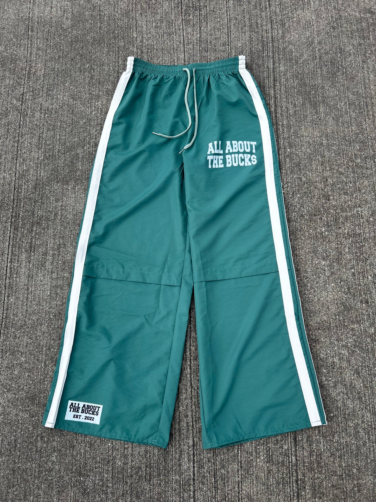 AllAboutTheBuck$ Green Nylon Sweats