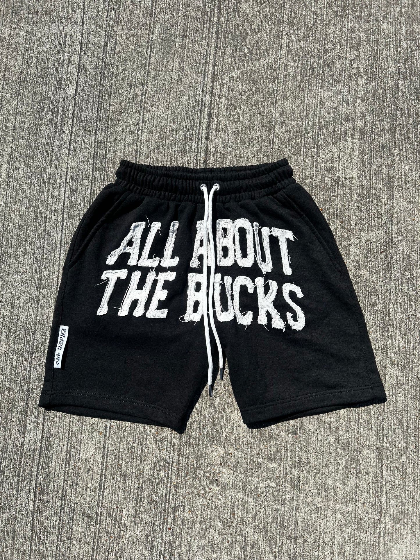 Black AllAboutTheBuck$ Distressed Shorts