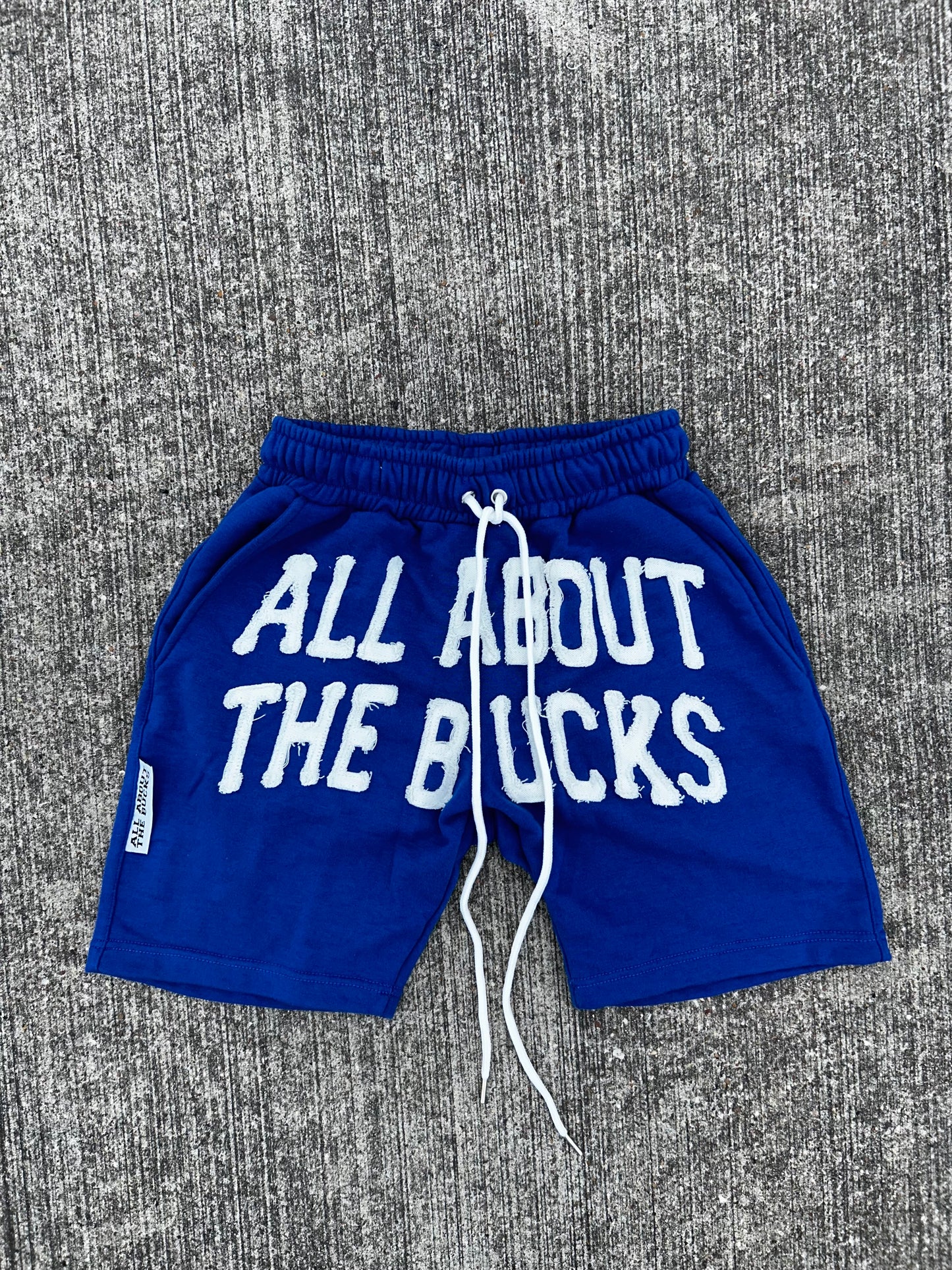 Blue AllAboutTheBuck$ Distressed Shorts